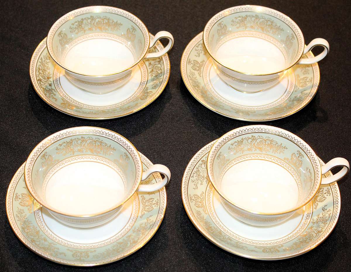 Up for sale are these Wedgwood Columbia Sage Green Set Of Four Peony Shaped Footed Cup & Saucer Sets in Excellent condition with no chips, cracks or crazing. The cups measure approx. 2 1/4"T by 4 1/8"W and the saucers 5 3/4"W. Shipping Excludes: Alaska/Ha