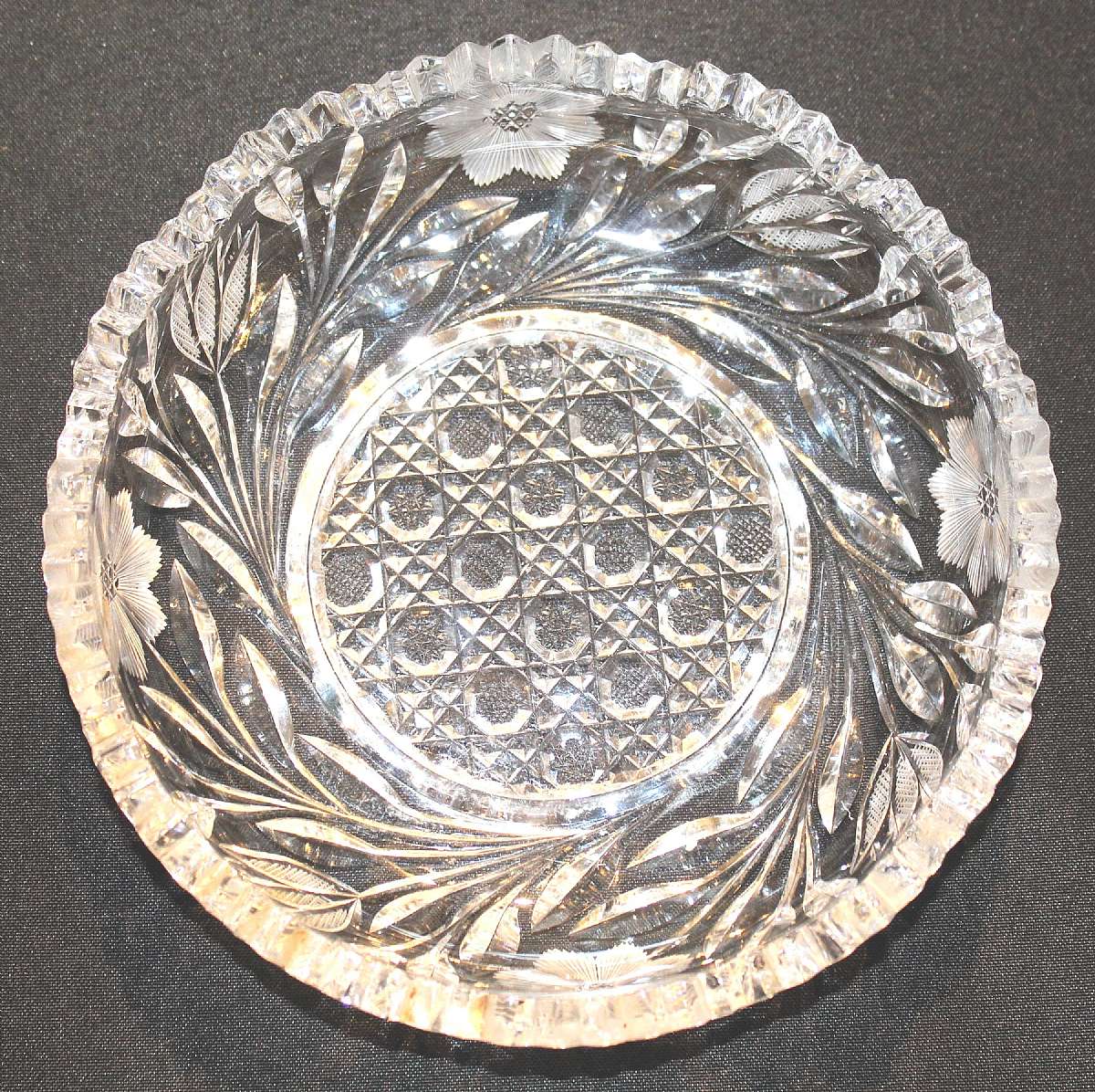 Up for sale is this Beautiful Antique Saw Tooth Rim Heavily Decorated Shallow Bowl. Measures approx. 8" wide by 1 3/4"T. No chips or cracks.Shipping Excludes: Alaska/Hawaii, US Protectorates, APO/FPO, PO BoxShipping Provided to the United Stat