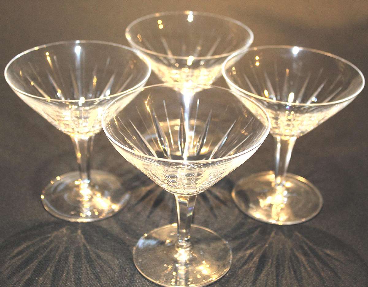 Up for sale are these Treasure Chest Sunburst Crystal Set Of Four Champagne Glasses in excellent condition with no chips or cracks. Included are Four 4 3/8" by 4 1/8"W Champagne Glasses.Shipping Excludes: Alaska/Hawaii, US Protectorates, APO/FP