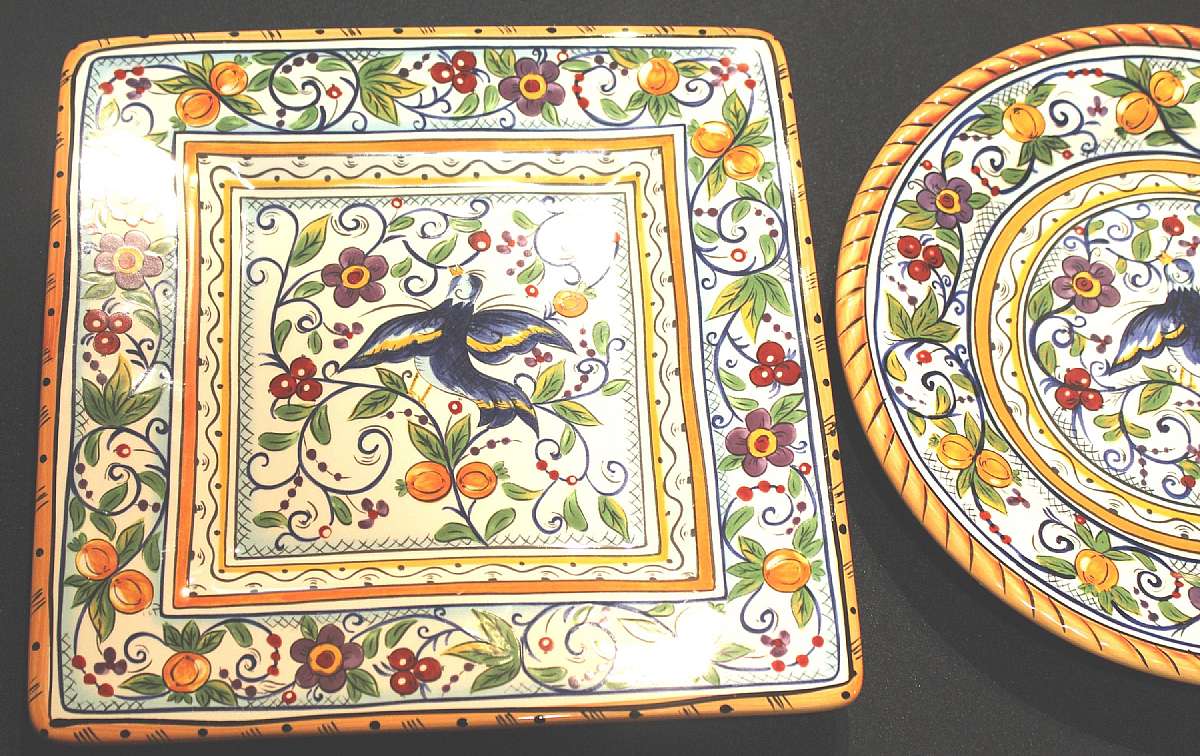 Up for sale are these Tabletops Unlimited Villa Paradiso Set Of 1 Round & 1 Square Dinner Plates in excellent condition with no chips or cracks. The round plate measures approx. 11 1/4"W & the square plate is 11 1/2"W.  Shipping Exclude
