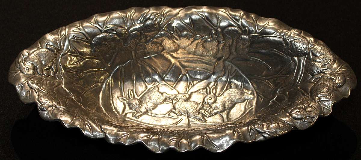 Up for sale is this Arthur Court Large Serving Bowl. The serving bowl measures approx. 15 3/4"L by 8"W by 3"D. The bowl is dated 1990. Shipping Excludes: Alaska/Hawaii, US Protectorates, APO/FPO, PO BoxShipping Provided to the United Stat