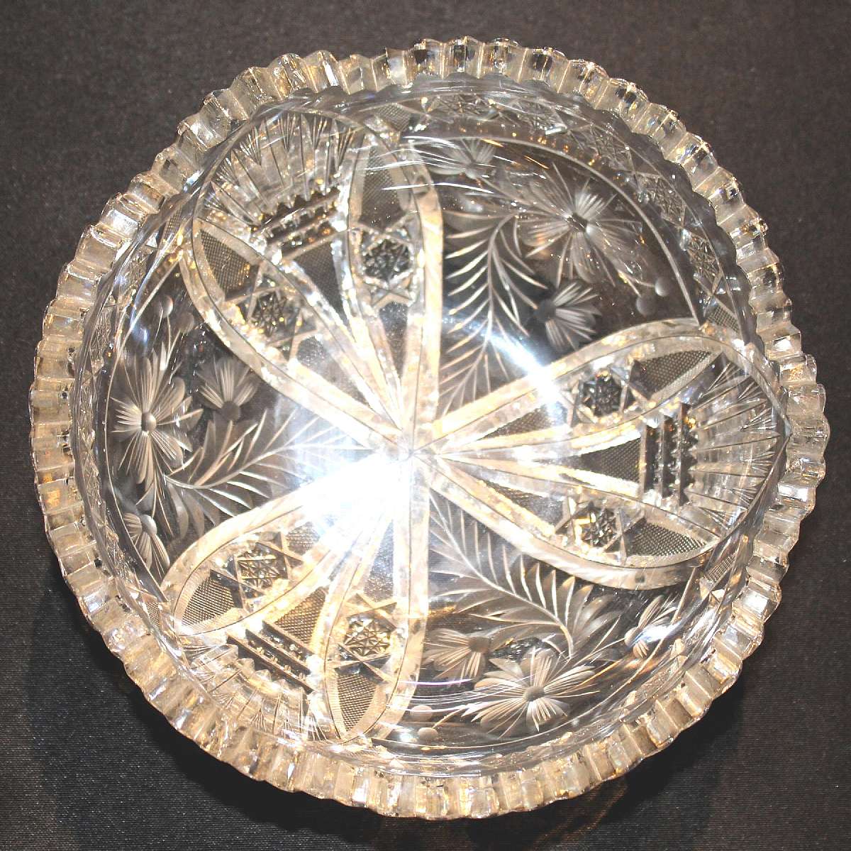 Up for sale is this Beautiful Antique Cut Glass Saw Tooth Rim Heavily Decorated Bowl. Measures approx. 8" wide by 3 3/4"T. This does some flea bites on the saw tooth rim. Shipping Excludes: Alaska/Hawaii, US Protectorates, APO/FPO, PO BoxShipp