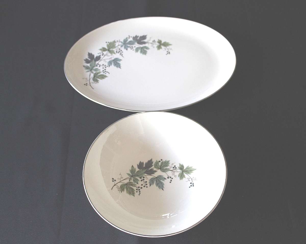 Up for sale are these Vintage Taylor Smith & Taylor Melody Lane Round Vegetable Bowl and Oval Platter in excellent condition with no chips or cracks. The bowl measures approx. 9"W by 2 1/2"D and the platter is 13 1/2"L by 10"W.  S