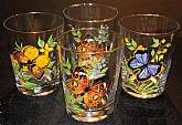 Up for sale are these Double Rocks Glasses With Butterfly Designs in good  condition with no chips or cracks. They do have some gold wear on the rim. They measure approx. 4 1/2" Tall by 3 5/8"W.Shipping Excludes: Alaska/Hawaii, US Protectorate