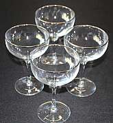Up for sale are these Lenox Ariel Platinum Set Of Four Champagne Glasses in great condition with no chips or cracks. They measure approx. 5 5/8"T by 3 3/4"W.Shipping Excludes: Alaska/Hawaii, US Protectorates, APO/FPO, PO BoxShipping Provided
