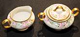 Up for sale is this Royal Bayreuth Antique Pink Rose Floral Creamer & Covered Sugar in great condition with no chips, cracks or crazing. Minor Gold Wear. The creamer & Sugar bowl measure approx. 2 3/4"T. This mark was used around 1902. Please