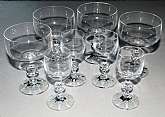 Up for sale are these Import Associates Claudia Set Of Four 4 3/8"T Cordials & Four 5"T Champagne Glasses in excellent condition with no chips or cracks. Shipping Excludes: Alaska/Hawaii, US Protectorates, APO/FPO, PO BoxShipping Provided