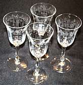 Up for sale are these Beautiful Lenox Castle Garden Set Of Four Wine Glasses in excellent condition with no chips or cracks. The wine glasses Measure approx. 6 3/4"T by 2 3/4"W.Shipping Excludes: Alaska/Hawaii, US Protectorates, APO/FPO, PO Bo